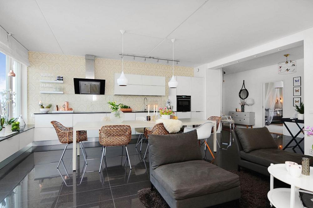 Thiết kế không gian mở nối liền phòng khách với khu vực nhà bếp của căn hộ