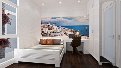 Phòng ngủ khác dành cho khách được trang trí bằng gam màu trắng chủ đạo, bức ảnh phong cảnh cỡ rộng mang lại cảm giác bình yên, dễ chịu