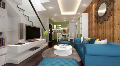 Phòng bếp được thiết kế liên thông với phòng khách, sử dụng màu xanh lá tươi mát