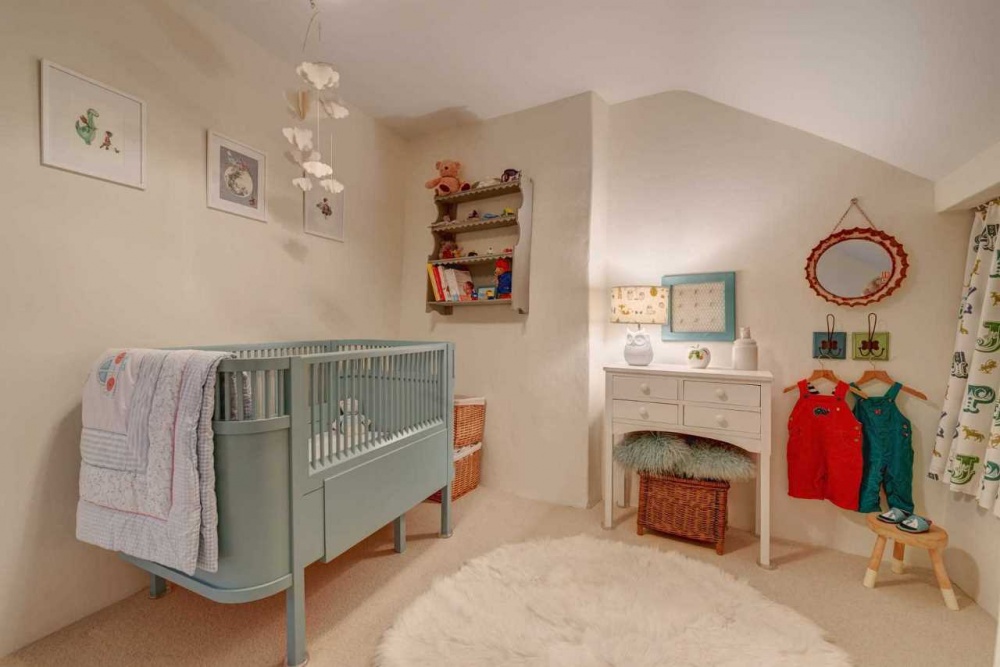 Căn phòng ngủ của trẻ em được bài trí đơn giản nhưng vô cùng xinh xắn