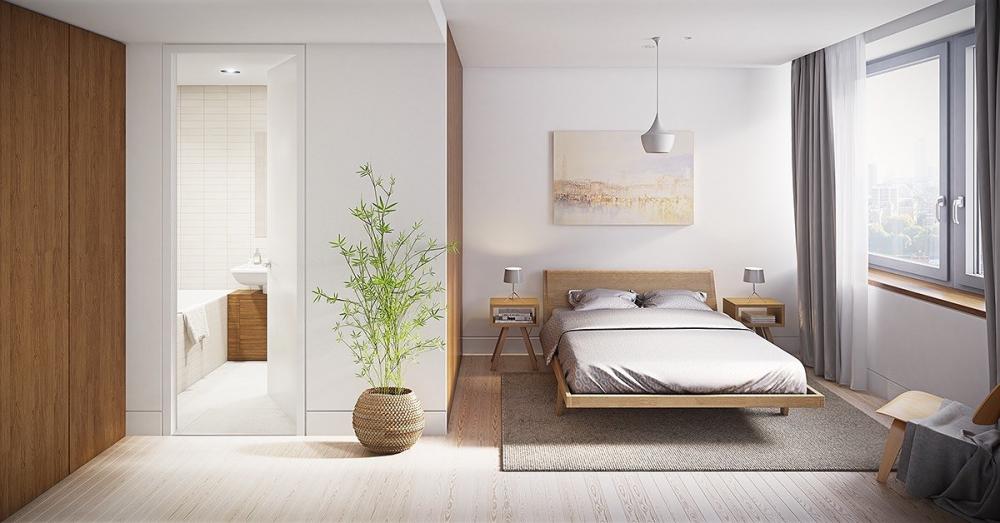Chậu cây cảnh xanh mướt mang đến nguồn năng lượng tràn đầy cho phòng ngủ tối giản.