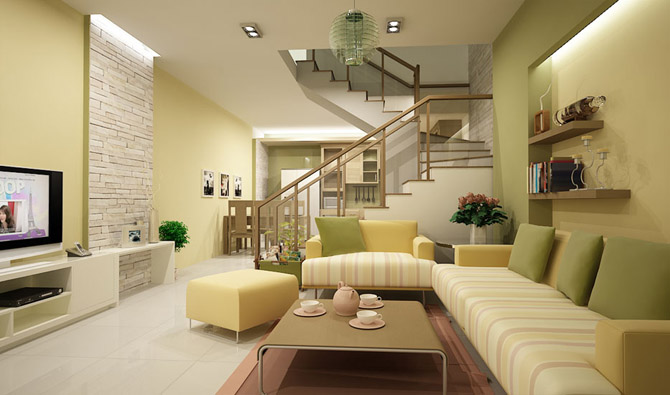 Mảng tường ốp gạch màu sáng tạo điểm nhấn hút mắt cho phòng khách có cầu thang.