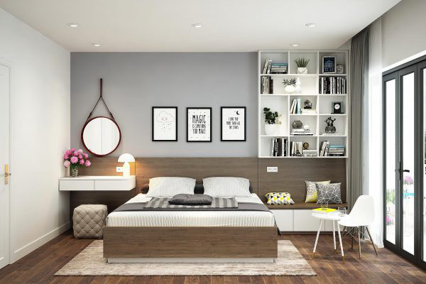 Hình ảnh phòng ngủ master phong cách tối giản với giường gỗ, gương tròn, tranh treo tường, giá sách gọn gàng