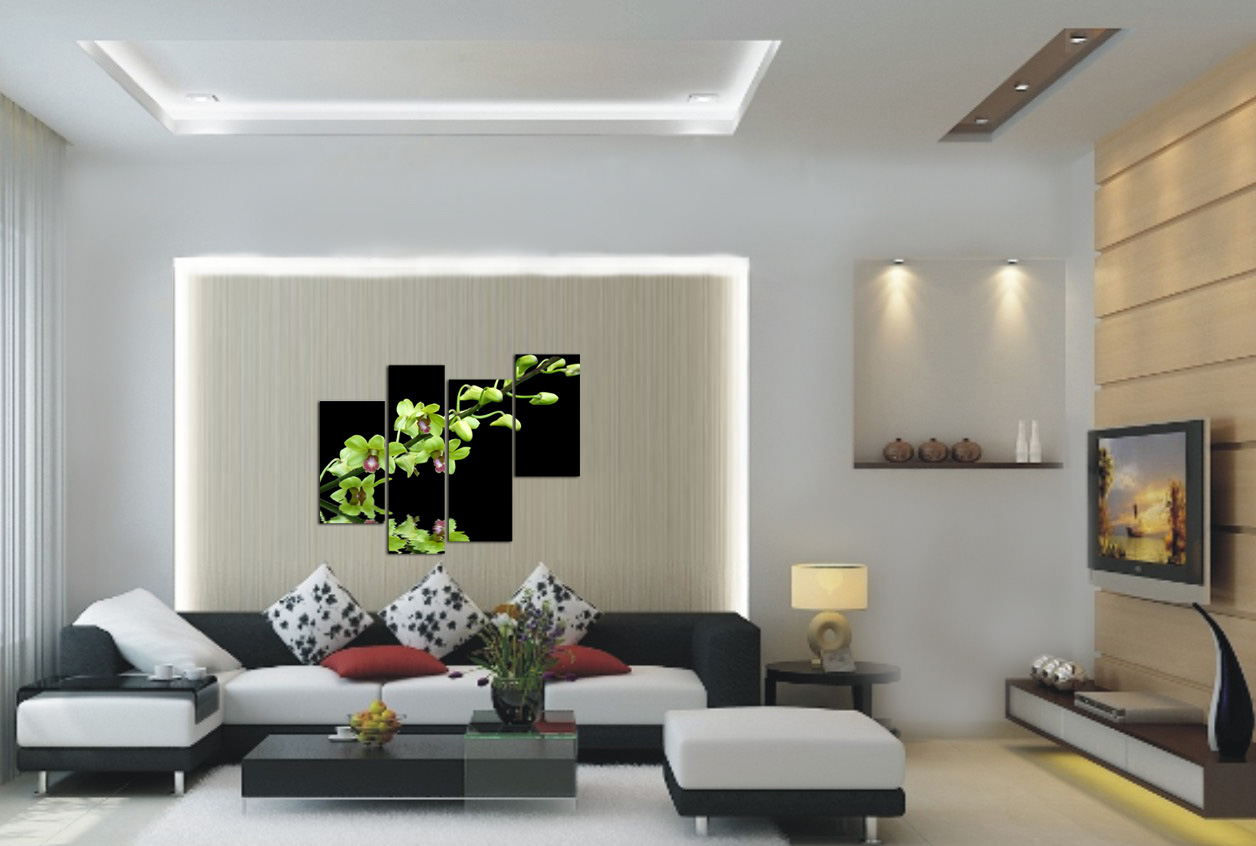 Hình ảnh mẫu thiết kế phòng khách hiện đại, sử dụng sắc trắng chủ đạo với điểm nhấn ấn tượng là bộ tranh hoa lan phía sau lưng ghế sofa.