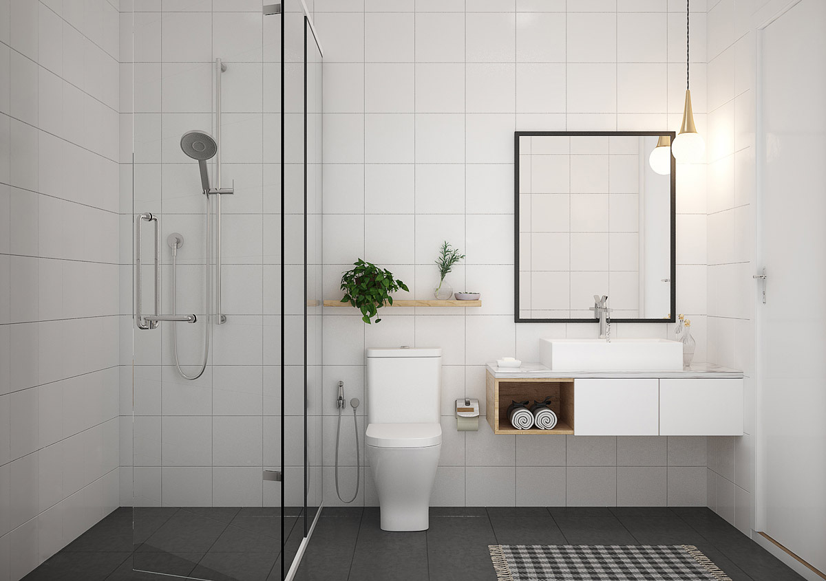 Hình ảnh phòng tắm trong căn hộ 45m2 màu trắng chủ đạo, vách kính phân tách khu tắm đứng và vệ sinh