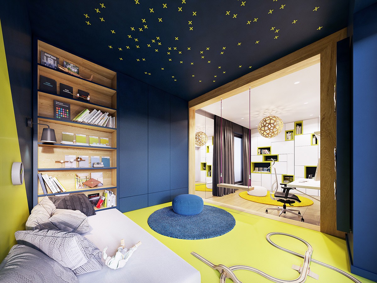 Hình ảnh phòng ngủ cho bé với tông màu vàng, xanh dương chủ đạo, kệ sách mở, trần họa tiết dấu nhân vàng