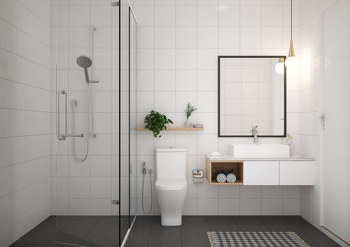 Hình ảnh phòng tắm với hai khu khô gồm bồn cầu, bồn rửa mặt, tủ đựng đồ; khu ướt gồm vòi sen, vách kính