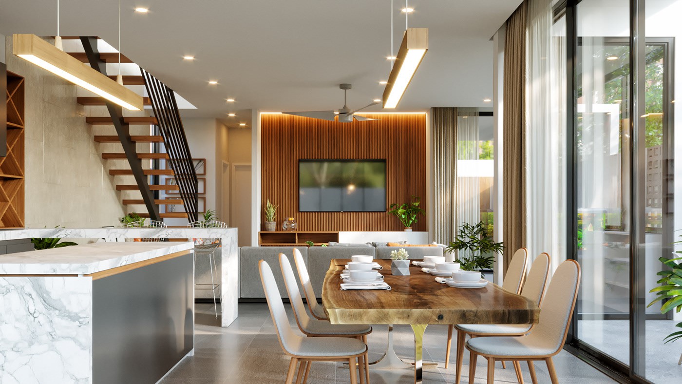 Hình ảnh một góc phòng bếp với bàn đảo bằng đá cẩm thạch, bàn ăn bằng gỗ, ghế bọc nệm sang trọng, cạnh đó là phòng khách, cầu thang sắt