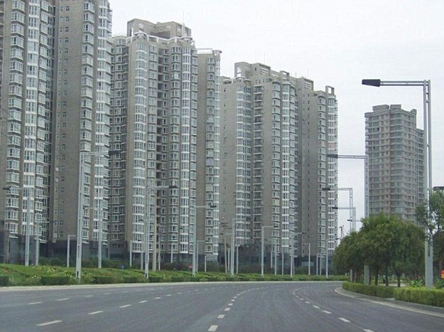 Zhengzhou New District residential towers: Soaring property prices in China and high levels of investment has fuelled the construction of up several new cities. Experts fear a subsequent property crash could damage the global economy Read more: http://www.dailymail.co.uk/news/article-2005231/Chinas-ghost-towns-New-satellite-pictures-massive-skyscraper-cities-STILL-completely-empty.html#ixzz1PjEBdxmc