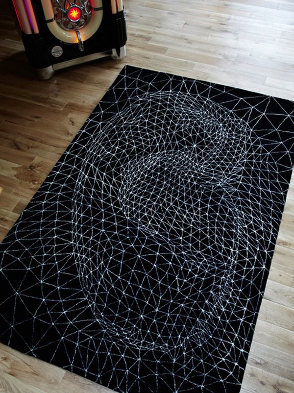 Một tấm thảm 3D trừu tượng tạo nên không gian huyền bí cho căn phòng.