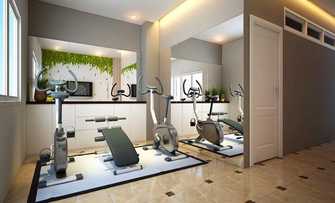 Phòng tập gym hiện đại và tràn ngập ánh sáng.