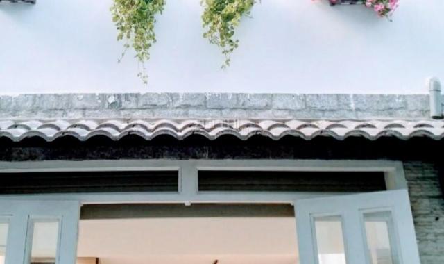 Cần bán nhà 1 trệt, 1 lầu, ngay ngã tư Gò Mây, DTSD: 56m2, sổ hồng riêng