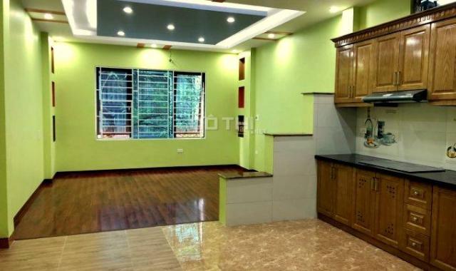 Bán nhà ngõ Linh Quang, ô tô vào nhà, thang máy xịn. DT 58m2 x 5 tầng, LH 0977495435