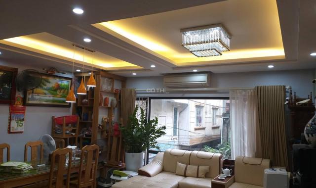 Bán nhà mặt ngõ phố Thái Hà 100m2 x 4,5T, ngõ 6m, gara ôtô, giá 13,5 tỷ. LH 0988.494.856