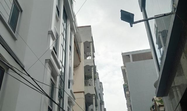 Bán tòa nhà 7 tầng, Phố Vũ Ngọc Phan, P. Láng Hạ, Đống Đa, DT 75m2x7T, giá 21 tỷ