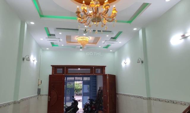 Nhà 1 trệt 3 lầu mặt tiền Quốc lộ 22 thuộc xã Tân Xuân, DT 4.5*30m, giá bán 7.8 tỷ. LH 0917739559
