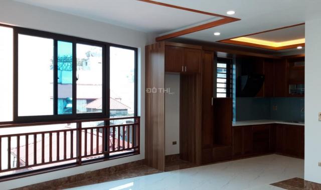 Bán nhà phố Chùa Láng, Đống Đa, DT 70m2 x 7 tầng thang máy, lô góc, tiện KD, VP giá 15.5 tỷ