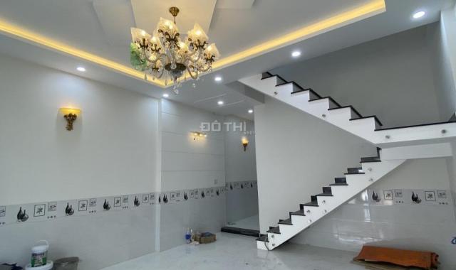 Nhà 1 trệt 1 lầu DT 100m2 đường xe hơi phù hợp an cư lâu dài tại chợ Cơ Khí