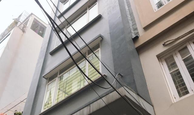 Bán gấp toà nhà phân lô Trung Kính đường đôi 81m2, 7 tầng thang máy. 19,5 tỷ