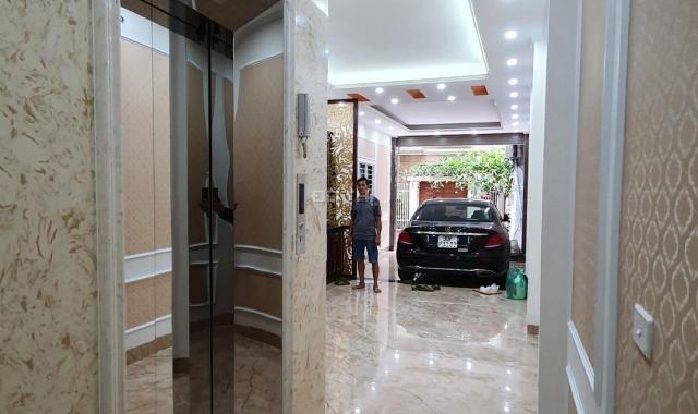 Bán nhà phố Đặng Tiến Đông, 58m2x6 tầng, MT 4.3m, gara, thang máy, KD VP, giá 12 tỷ