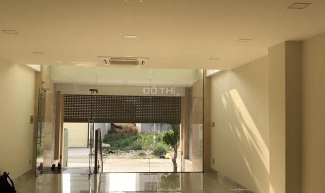 Bán tòa nhà văn phòng mới 100% DT 5x20m hầm thang máy 4 lầu trống suốt - giá 31 tỷ - An Phú - Q2