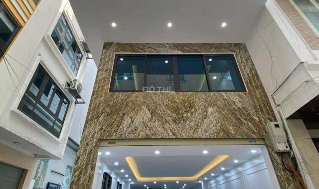 Bán nhà mặt ngõ Nguyễn Khang dt 59 m2 x 7 t thang máy lô góc ô tô 7 chỗ vào nhỉnh 14 tỷ