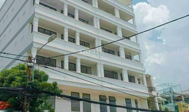 Bán tòa nhà văn phòng khu Bình Thạnh diện tích 658m2 đất có 7 tầng + sân thượng
