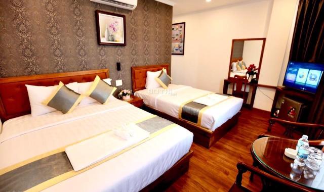 Xuất ngoại bán khách sạn mặt tiền Trần Phú, 10x20 210m2 đang kinh doanh, bãi tắm biển, chợ đêm 500m