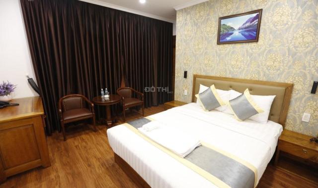 Xuất ngoại bán khách sạn mặt tiền Trần Phú, 10x20 210m2 đang kinh doanh, bãi tắm biển, chợ đêm 500m