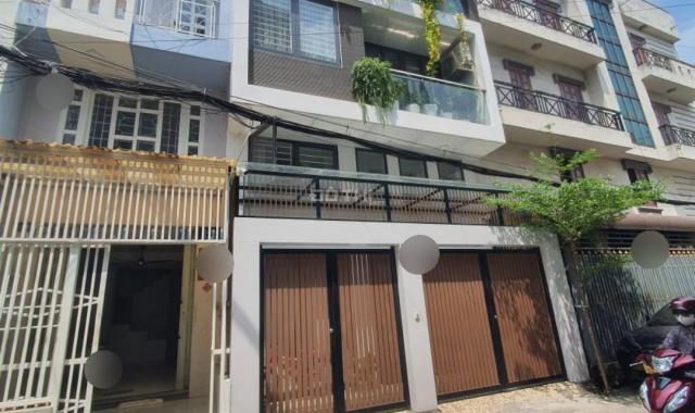 Quá rẻ bán nhanh nhà HXh8m Nguyễn Hồng Đào, p14,Tân Bình.dt 3x10. đúc 4 lầu. chỉ nhỉnh 5 tỷ