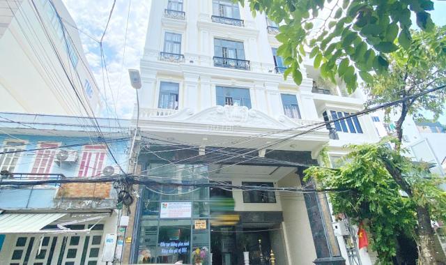 Bán toà nhà căn hộ dịch vụ 8 lầu DT: 10x32.5m, 29 Đường Số 81 Tân Quy, Q7