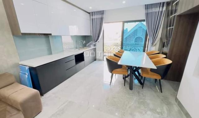 Bán nhà mới 6 Tầng thang máy Gara ôtô kinh doanh phố tứ liên