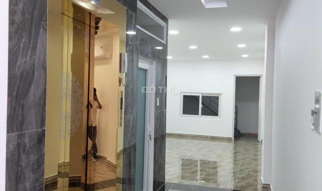 Cho thuê tòa nhà văn phòng 124A Lê Quang Định, có hầm 7 tầng, PCCC