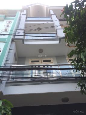Cần cho thuê nhà đường Lê Đức Thọ, dt 5x14m, nhà mới 1 trệt, 3 lầu, giá 18 triệu/th