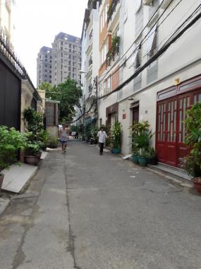 Bán nhà đang cho thuê căn hộ dịch vụ 65m2, 6 lầu, 23 phòng, Nguyễn Trãi, Q. 1