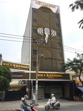 Bán tòa nhà Karaoke Friday mặt tiền Tân Sơn Nhì, 10x35m, trệt, lửng 6 lầu ST. Đang thuê 300 tr/th