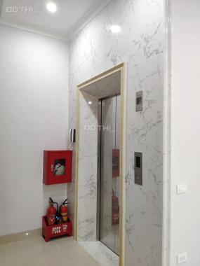 Tòa nhà phố Kim Mã 52m2 x 10T, thang máy, gara ô tô, doanh thu 140tr/th, 16 tỷ