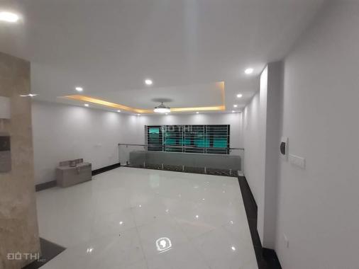 Tòa nhà văn phòng 7 tầng thang máy mới, kinh doanh đỉnh gara để 2 ô tô, phố Nguyễn Ngọc Nại 9,9 tỷ