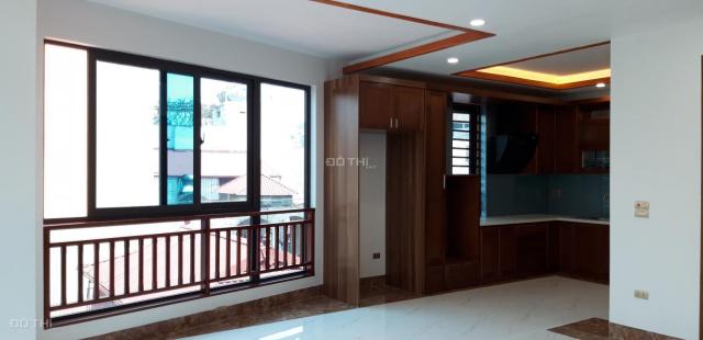 Bán nhà phố Chùa Láng, Đống Đa, DT 70m2 x 7 tầng thang máy, lô góc, tiện KD, VP giá 15.5 tỷ