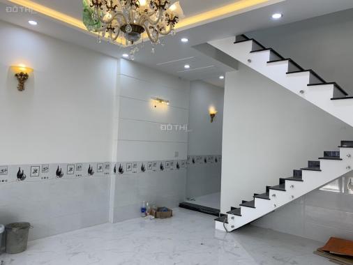 Nhà 1 trệt 1 lầu DT 100m2 đường xe hơi phù hợp an cư lâu dài tại chợ Cơ Khí