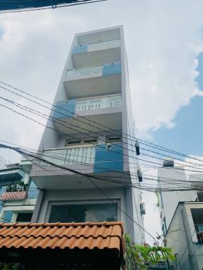 Cần bán gấp nhà 6 lầu góc 2 mặt tiền đường sát đường Phan Đăng Lưu, phường 7, quận Phú Nhuận.