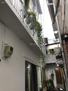 Bán nhà có sổ hồng đường Tân Hải, Tân Bình 50m2, 4 lầu BTCT, giá rẻ