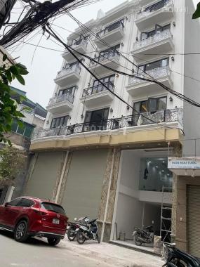 Mặt phố Trần Hữu Tước - mới xây 6 tầng thang máy - dt 56m2 - oto đỗ cửa - giá 19 tỷ