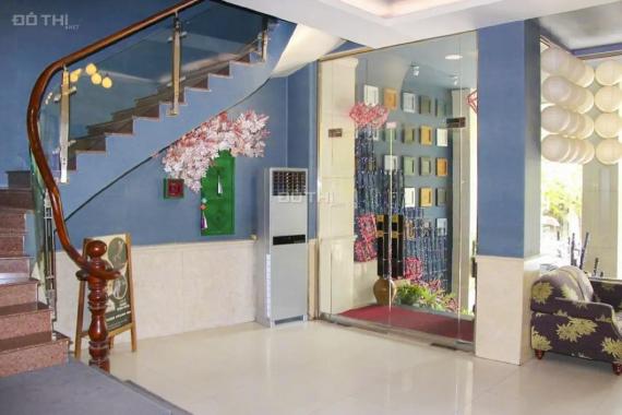 Bán khách sạn Lê Thánh Tôn quận 1 1 hầm 1 lửng 10 lầu DT 144m2