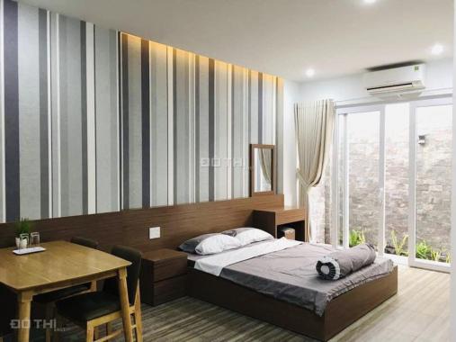 Bán nhà 4 tầng có 7 căn hộ cho thuê đường B1 VCN Phước Hải, Nha Trang