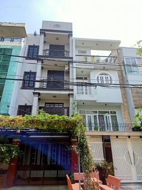 Bán gấp căn nhà DT 5 x 24,5m, 3 lầu, ST đường Phan Huy Ích. Giá 10,5 tỷ TL