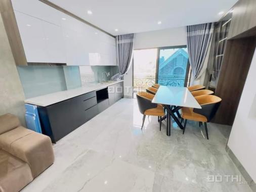 Bán nhà mới 6 Tầng thang máy Gara ôtô kinh doanh phố tứ liên