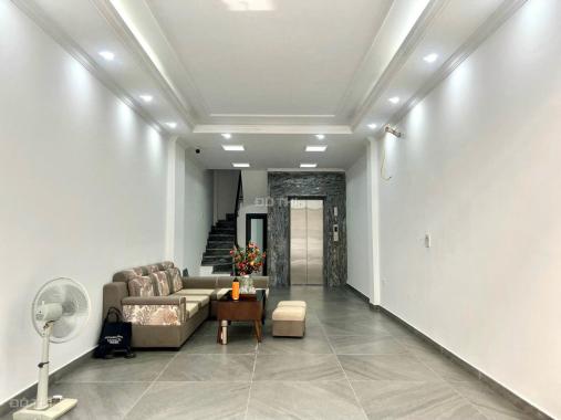 Nhà mặt ngõ thông kinh doanh Quan Hoa, Cầu Giấy 52m2x7T thang máy, ôtô vào nhà 10 tỷ