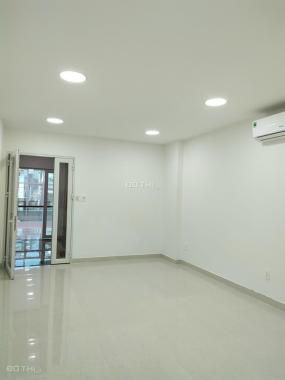 Cho thuê tòa nhà văn phòng 124A Lê Quang Định, có hầm 7 tầng, PCCC
