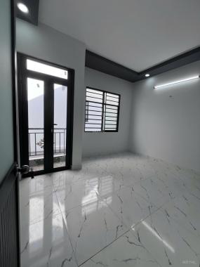 Bán gấp nhà 2 tầng gần chợ Hóc Môn, sổ hồng riêng, giá chỉ 750 triệu, vào ở ngay!